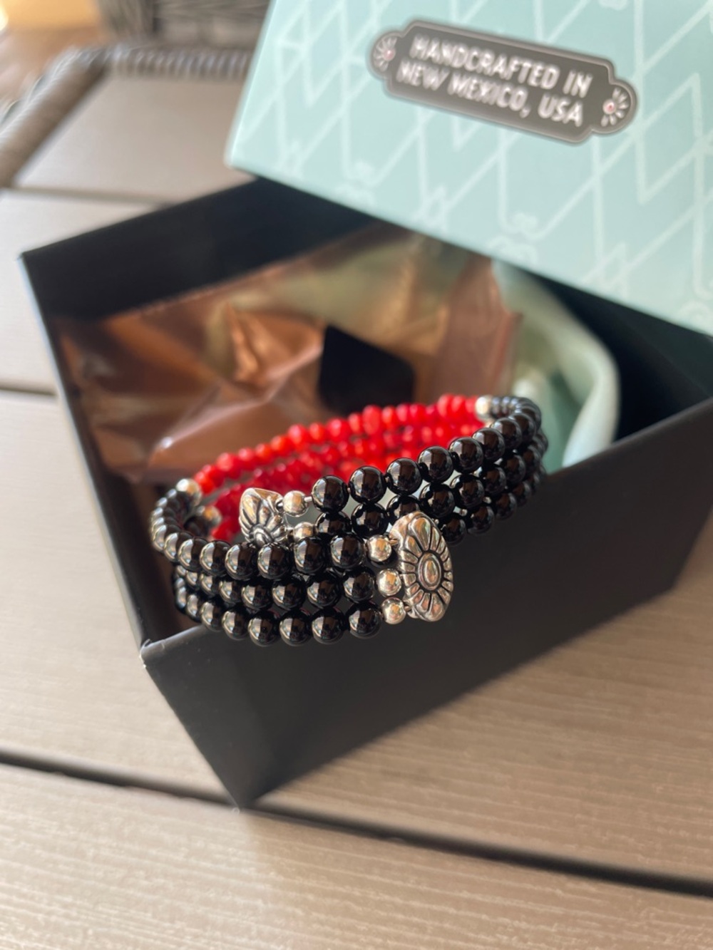 Carolyn Pollack red coral and onyx coil bracelet. Medium New